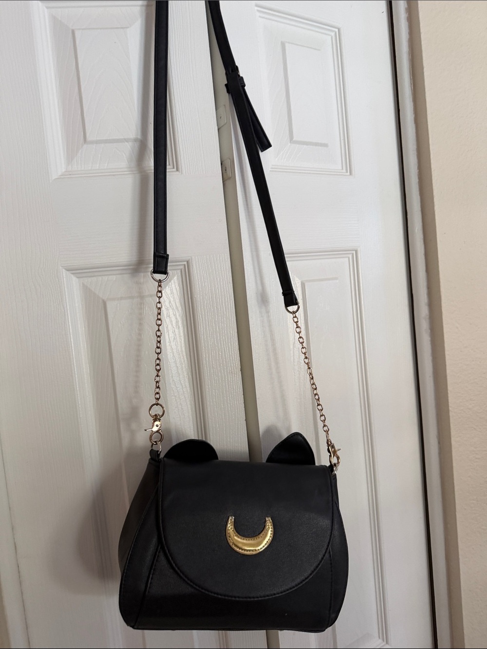 Black Cat Ear Crossbody Bag with Gold Crescent Accent